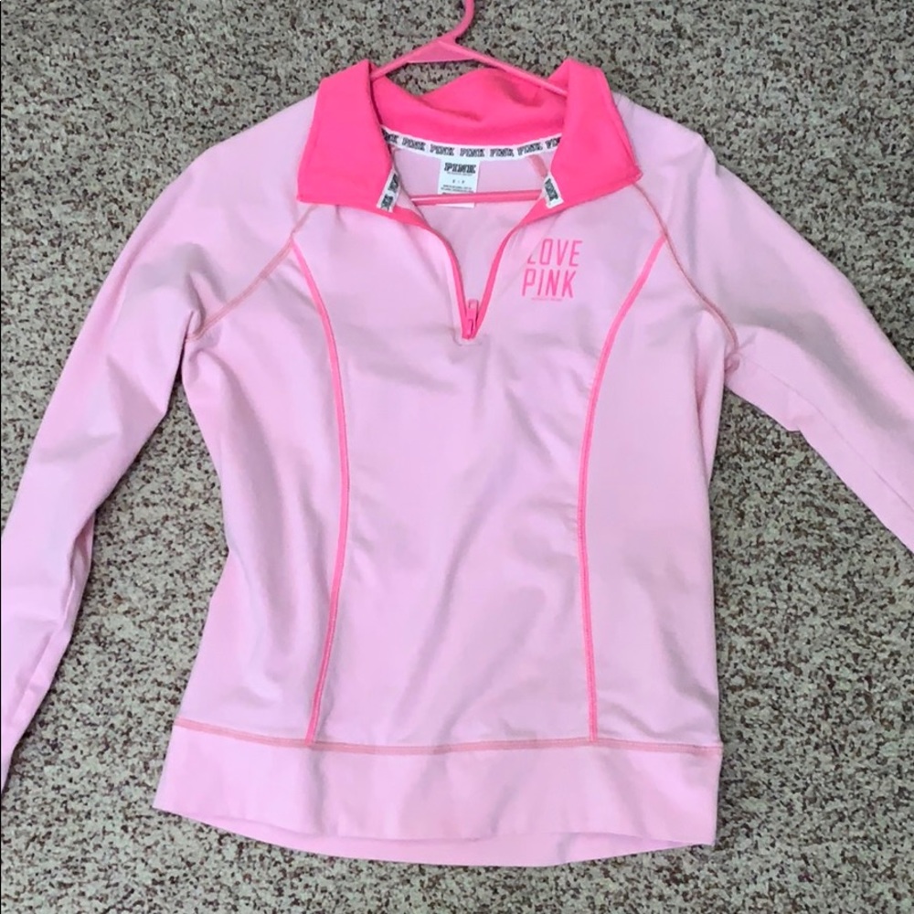Pink pullover.